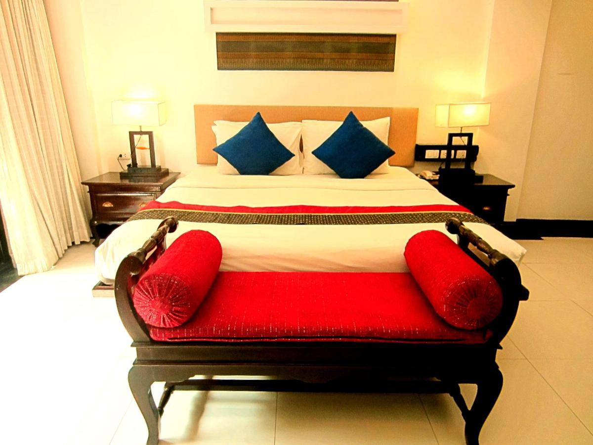 Deluxe met kingsize bed, begane grond