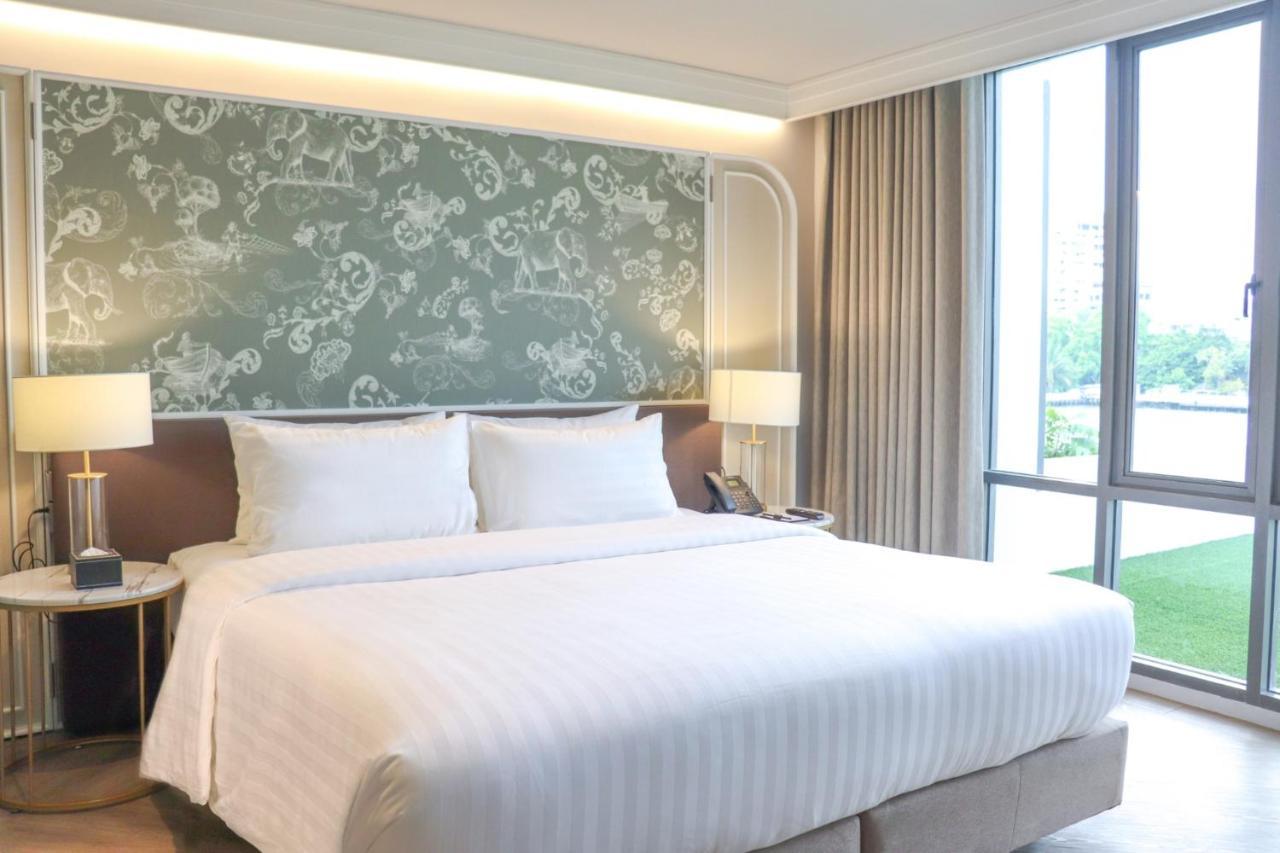 Zimmer Quarter mit Kingsize-Bett und Flussblick
