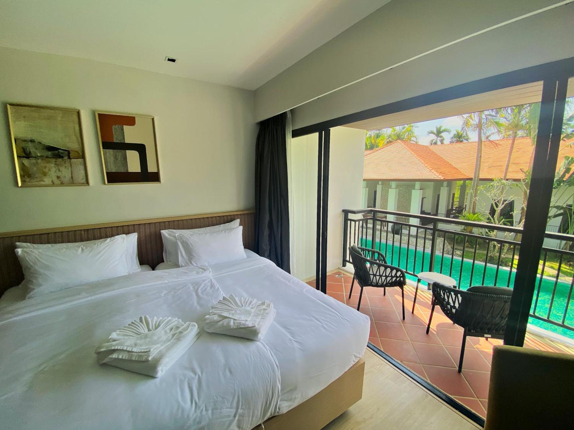 Chambre Lits Jumeaux - Vue sur Piscine