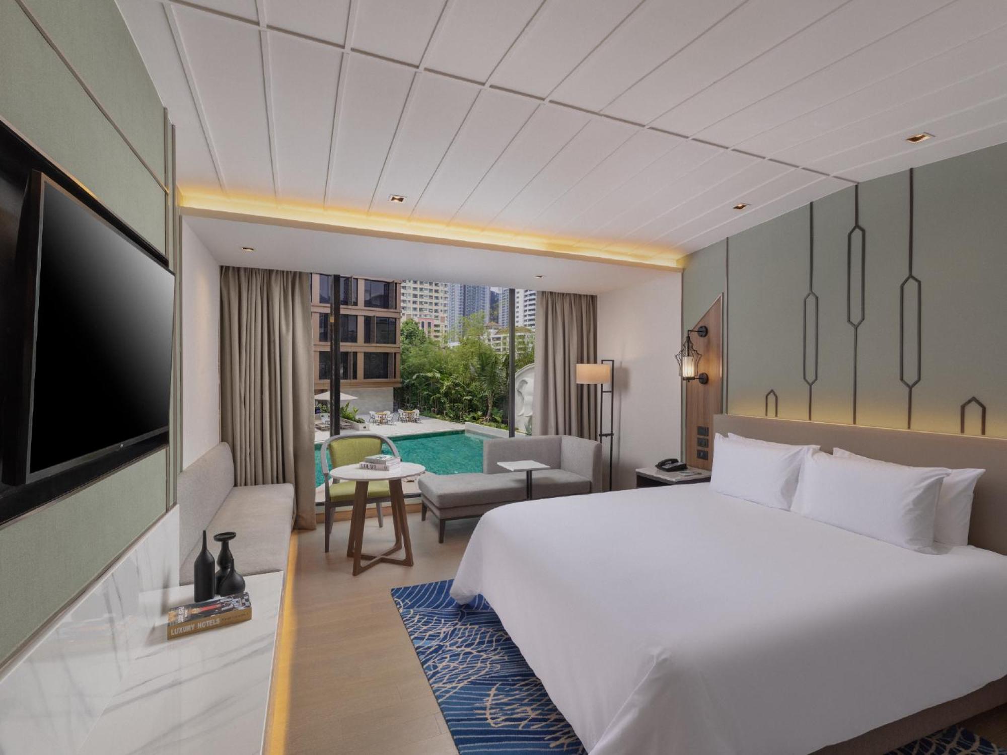 Premier Zimmer mit Poolblick
