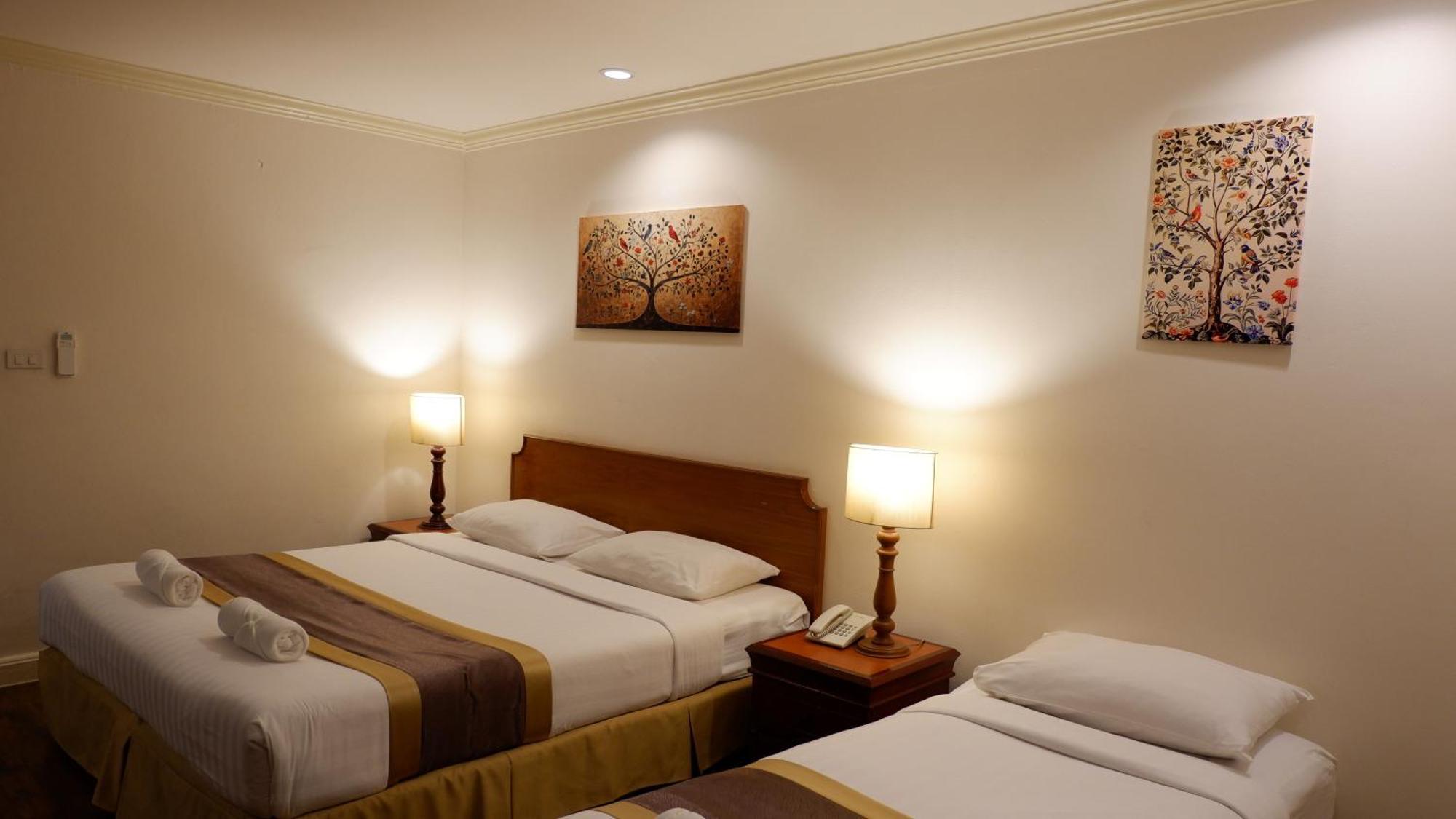 Deluxe Triple Room